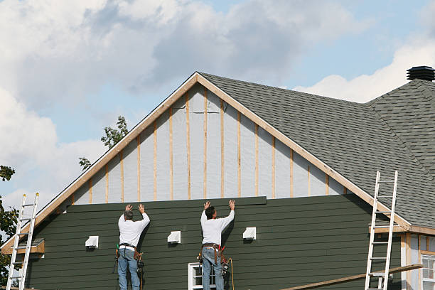 Professional Siding Installation technician working in Smithfield, OH